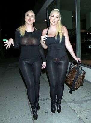 2 curvaceous huge-chested women..