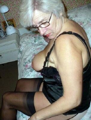Sandy-haired grannie doing oral..